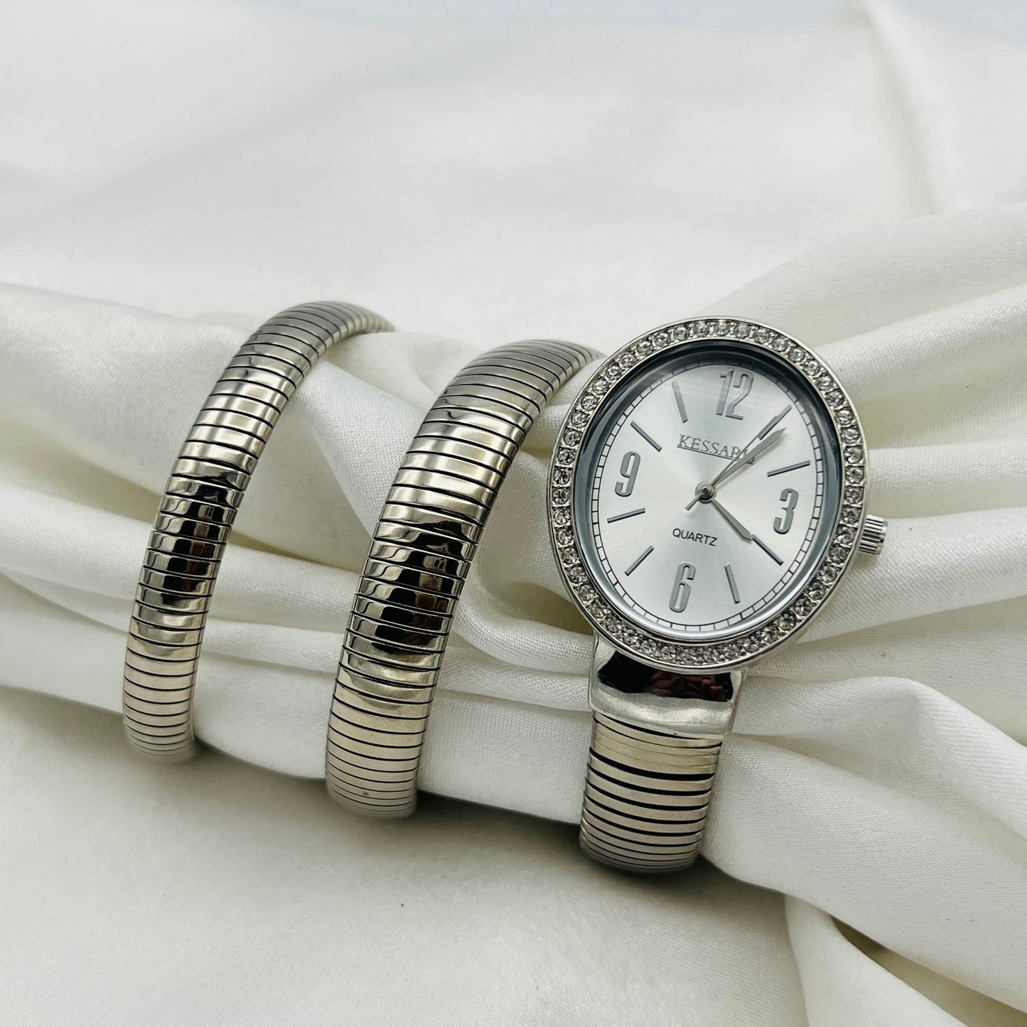 Silver-Toned Wrap Watch Similar to the Bvlgari Serpenti Watch Price: ~$7,000