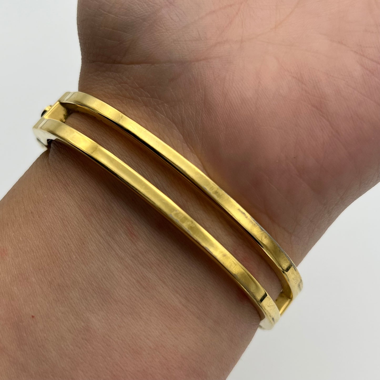 Gold-Toned Peek-a-boo Watch with White Stone