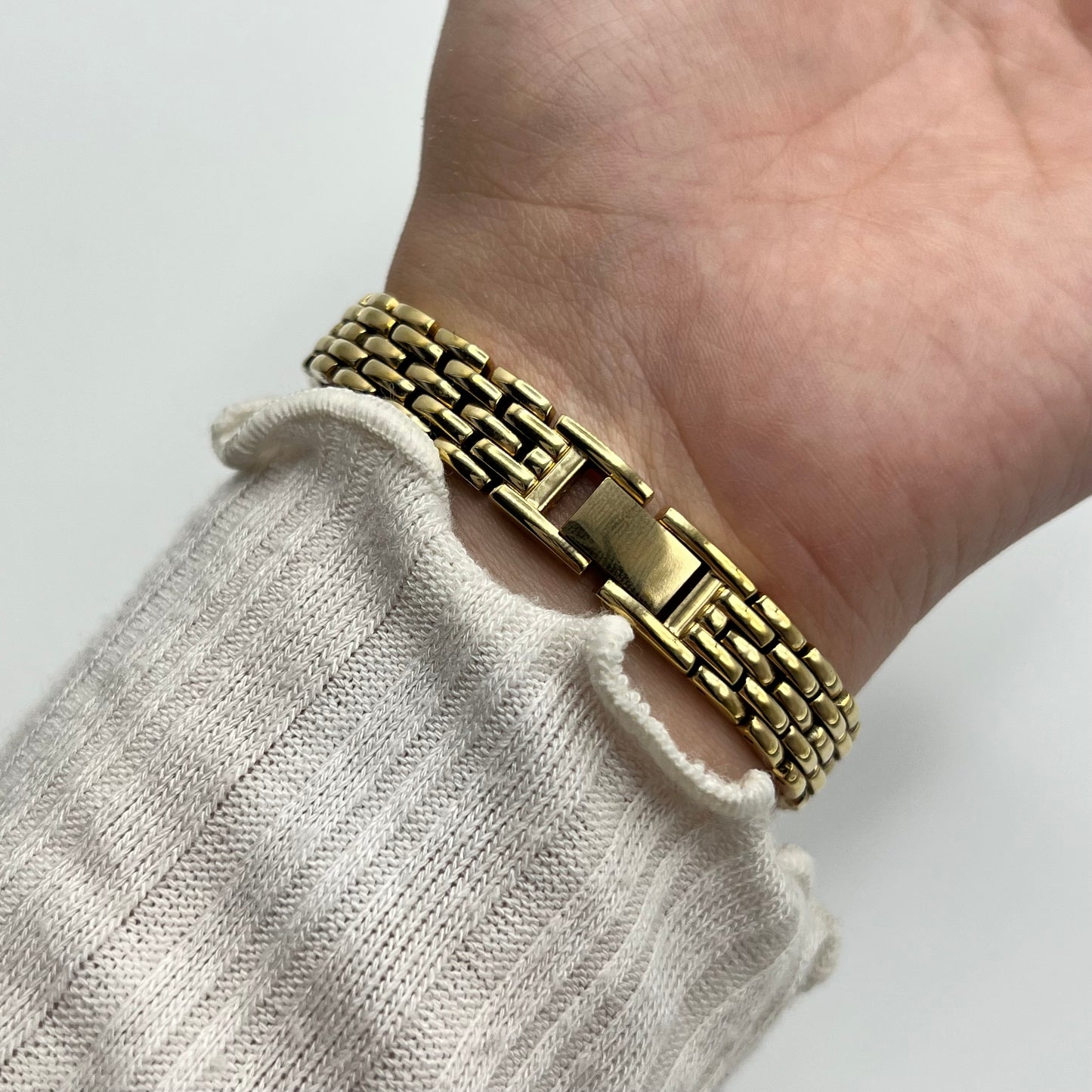 Gold-Toned Watch with Black Dial