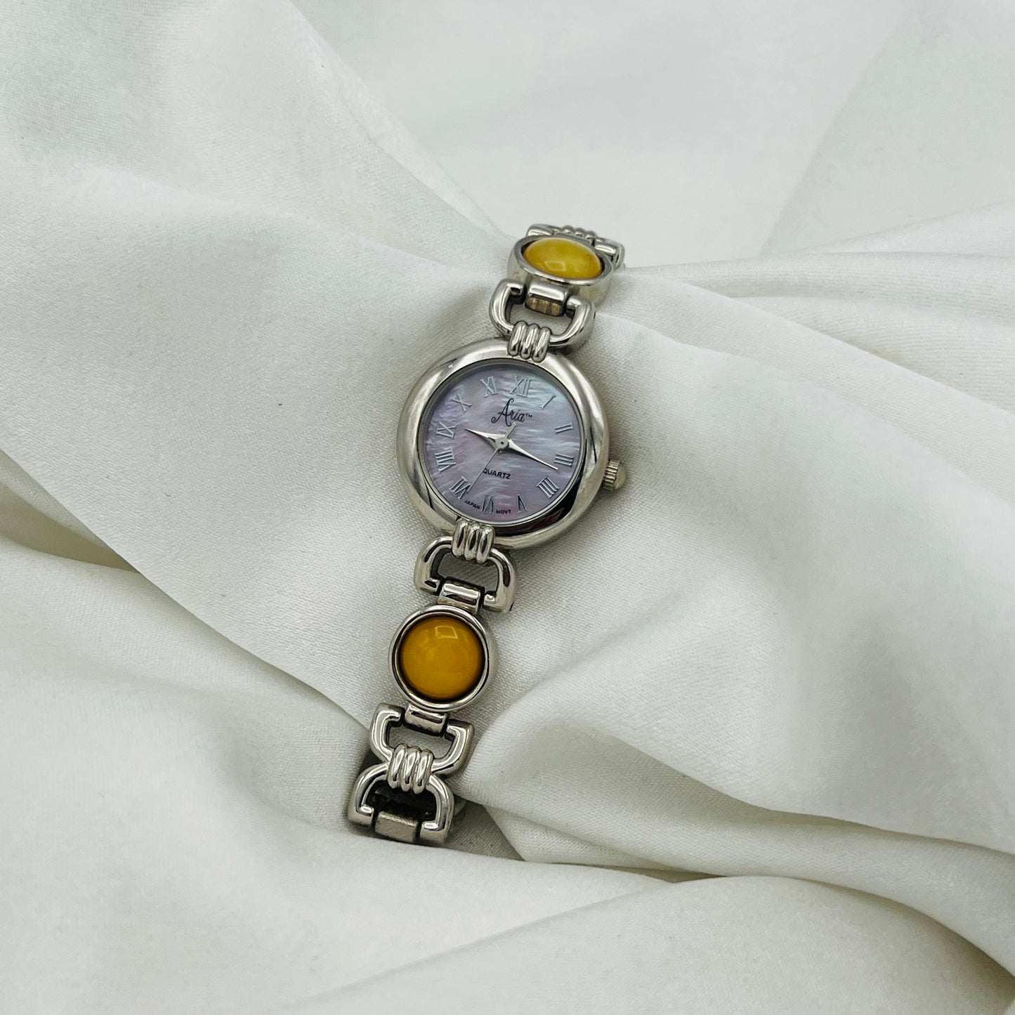 Yellow Gemstone Watch with Pink Iridescent Dial