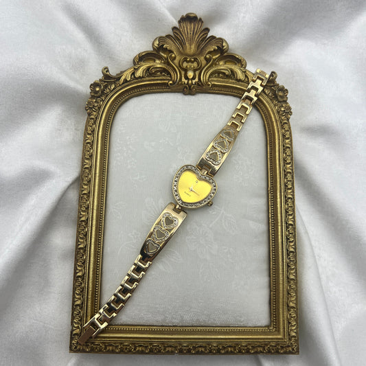 Gold Tone Heart Watch with Champagne Dial