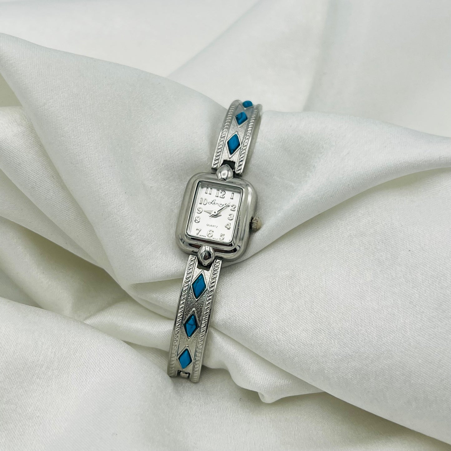 Dainty Silver-Toned Watch with Turquoise Details