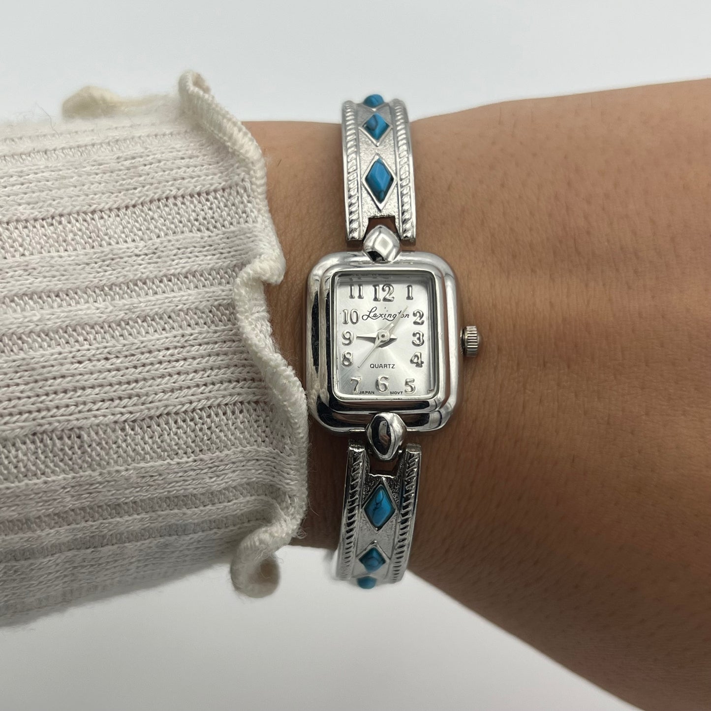 Dainty Silver-Toned Watch with Turquoise Details