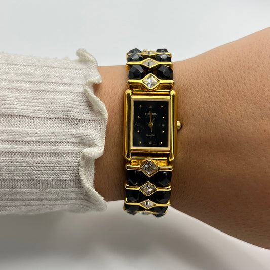 Gold-Toned Watch with Black Crystals