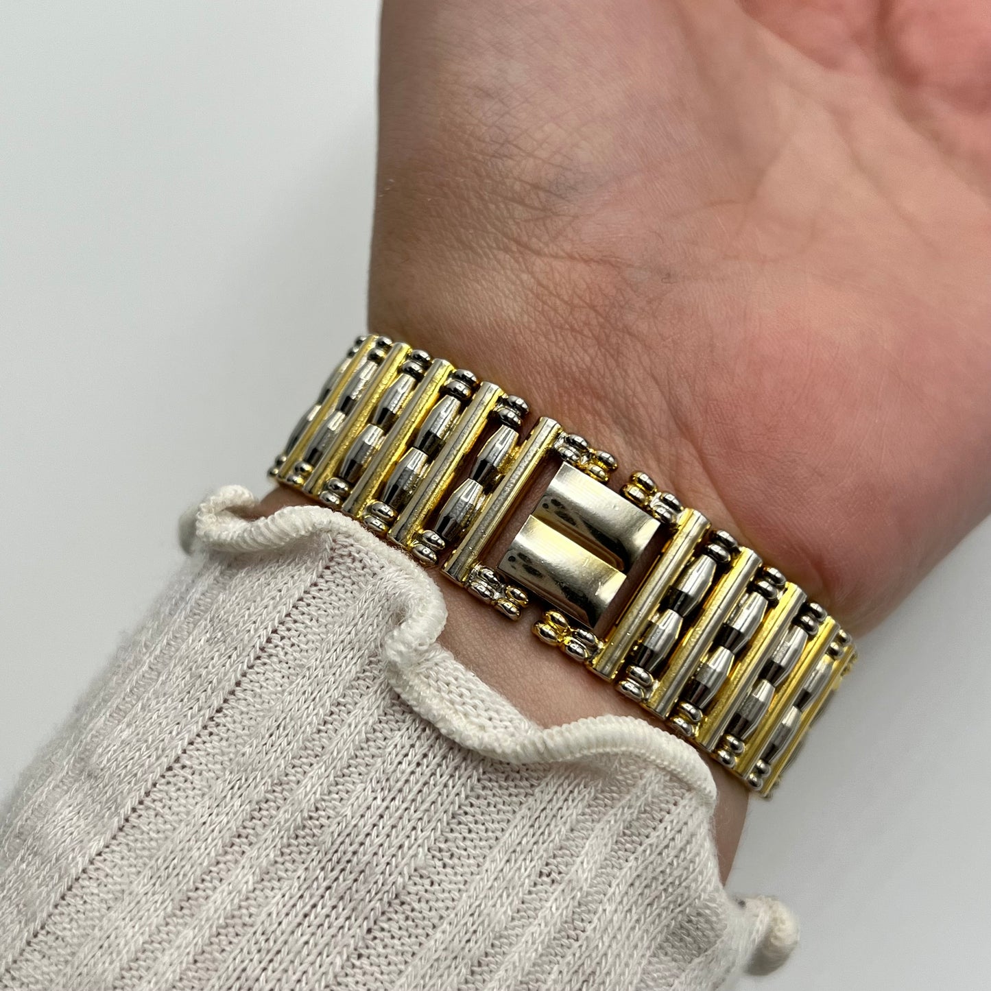 Detailed Gold-Toned Watch with Mother of Pearl Dial