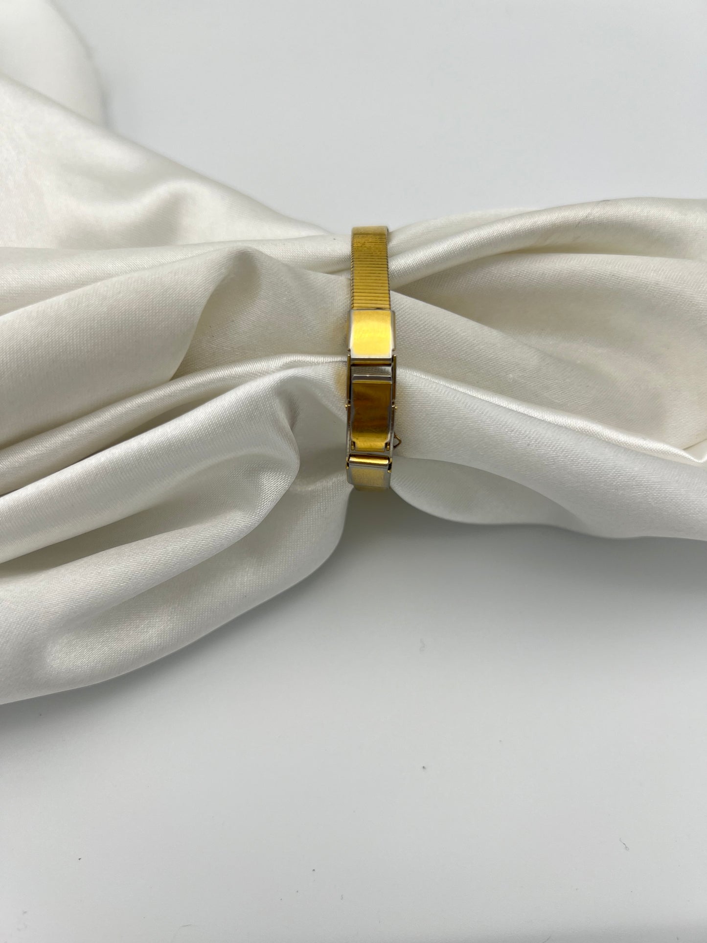 Dainty Gold-Toned Pulsar Watch