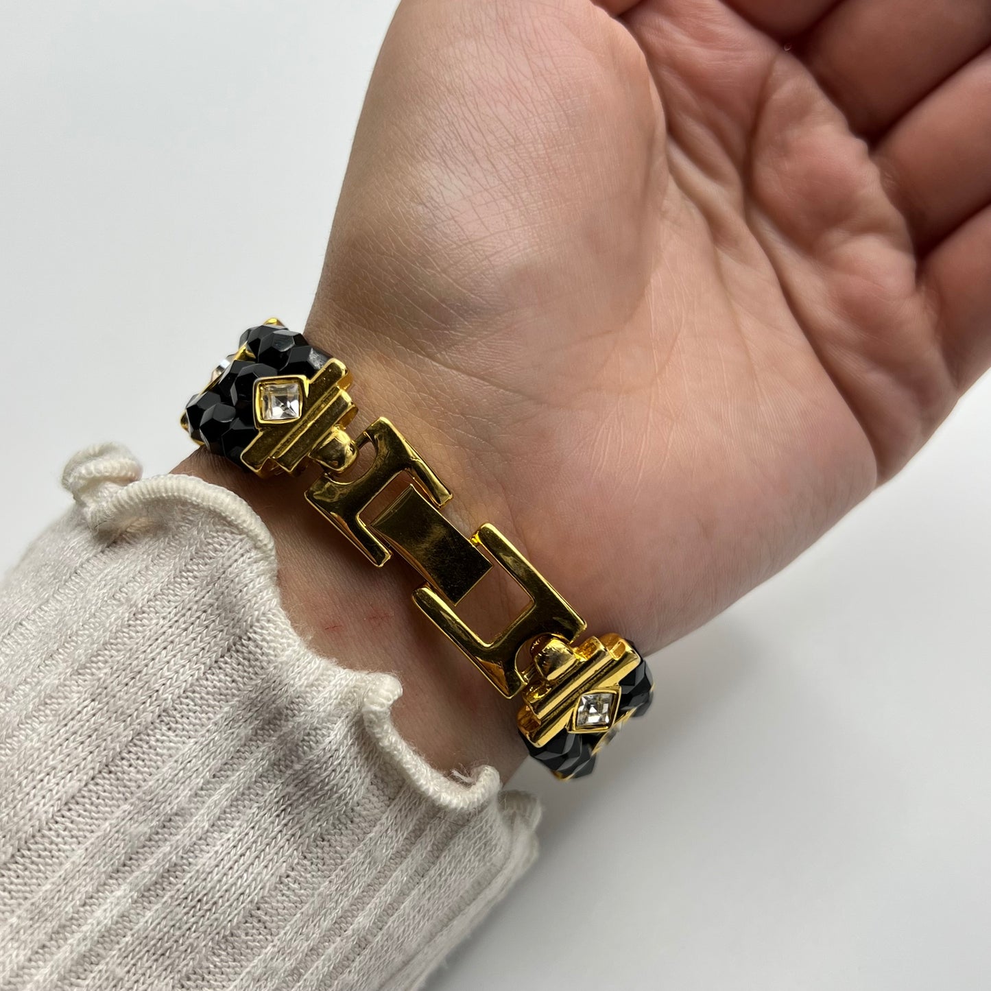 Gold-Toned Watch with Black Crystals