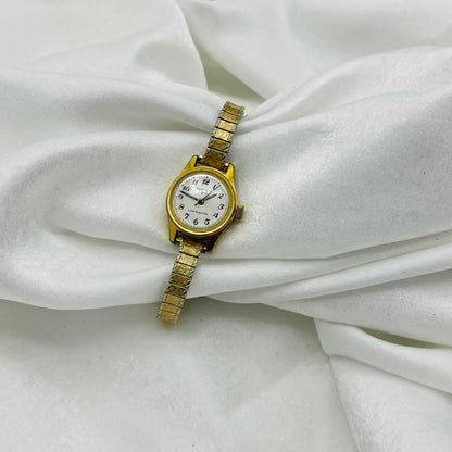 Dainty Gold Vintage Expansion Watch