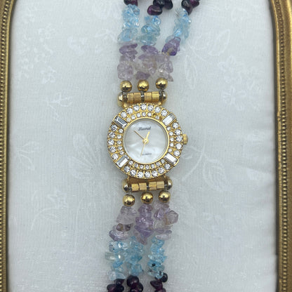 Gold-Toned Lucoral Watch with Multi-Colored Crystal Strap