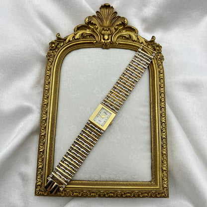 Detailed Gold-Toned Watch with Mother of Pearl Dial