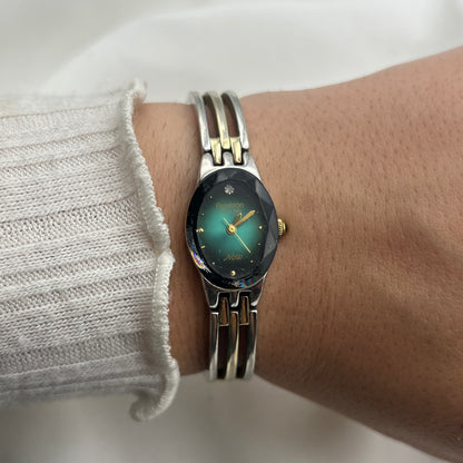 Two-Tone Emerald Carved Dial Watch