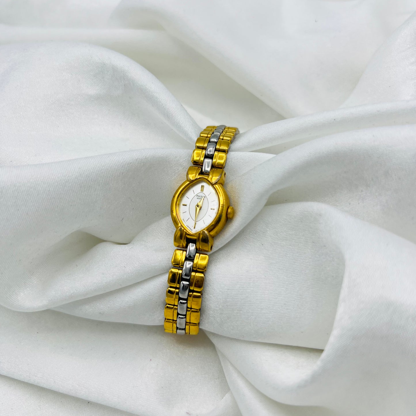 Dainty Two-Toned Pulsar Watch