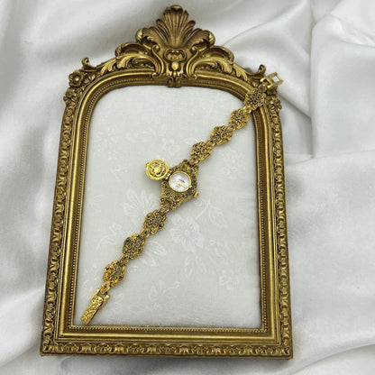 Elegant Art Deco Gold Tone Peek a Boo Watch