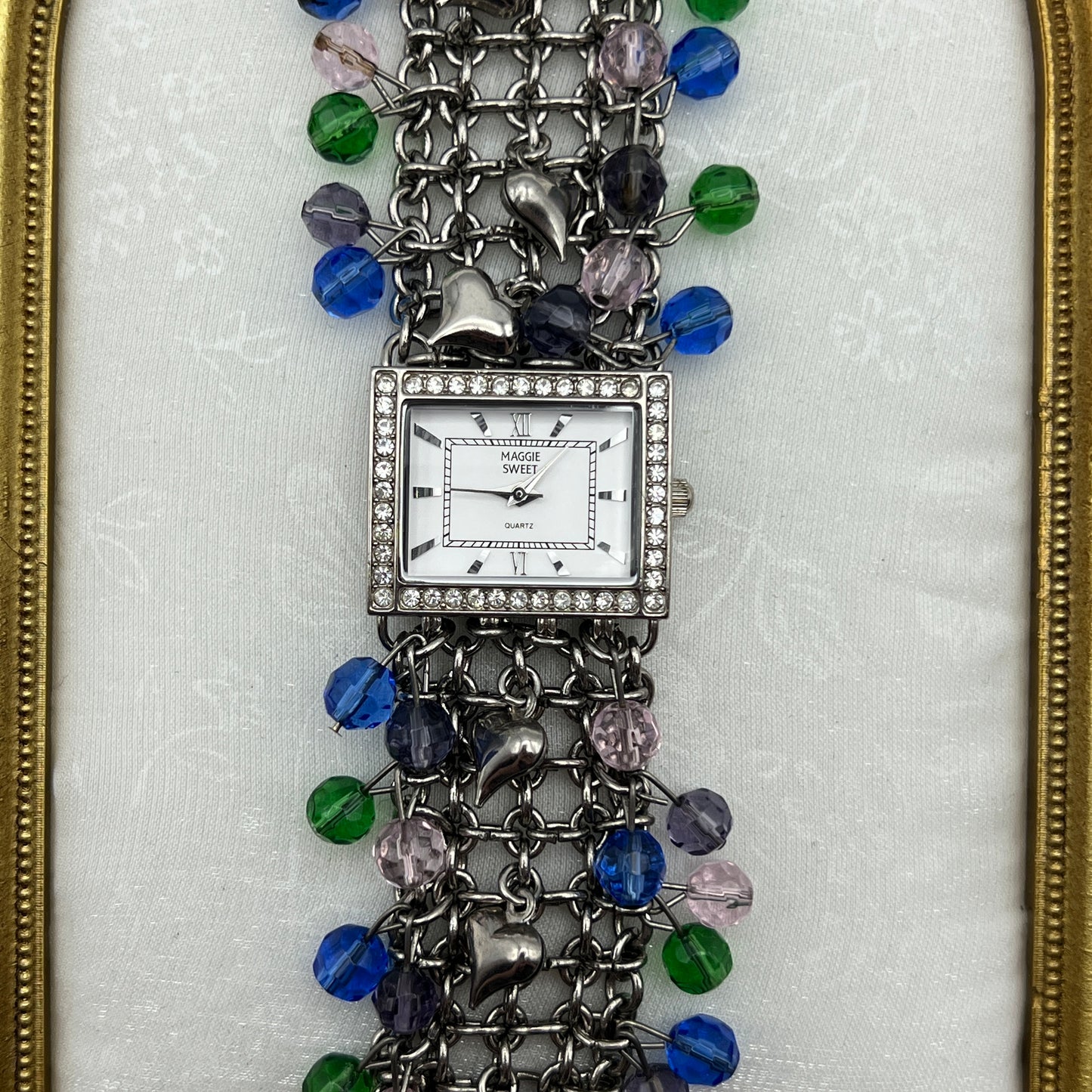 Silver-Toned Watch with Charms