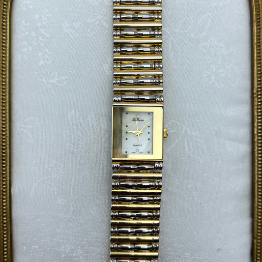 Detailed Gold-Toned Watch with Mother of Pearl Dial
