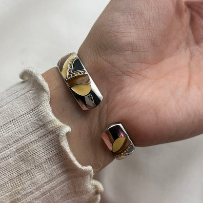 Abstract Peek-a-Boo Cuff Watch