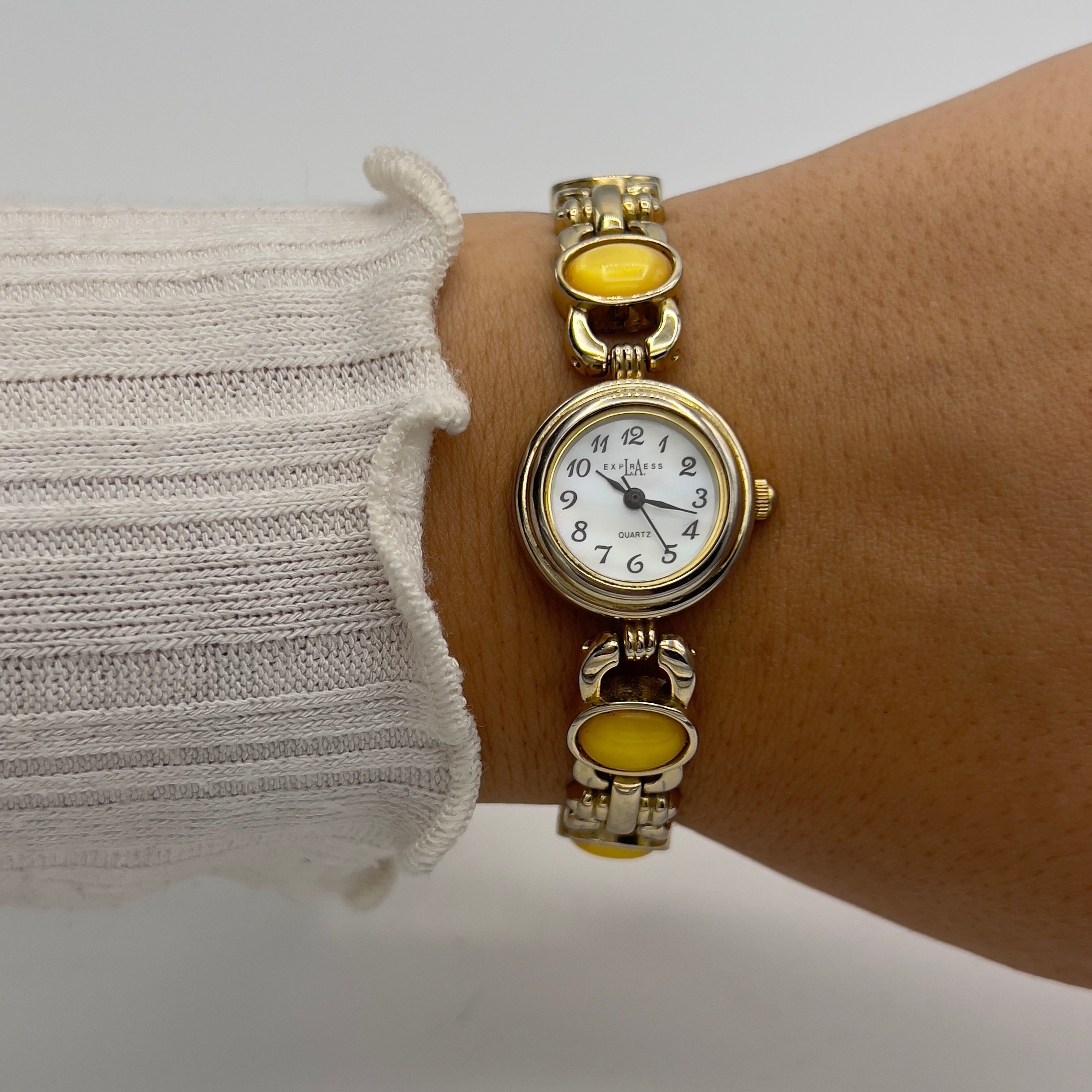 💛 Gold-Toned Watch with Yellow Gemstones