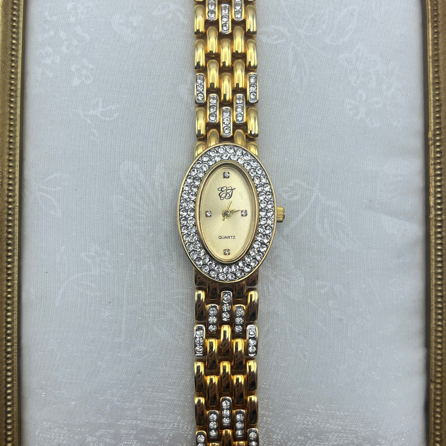 Elizabeth Taylor Gold Tone Watch with Oval Diamanté Dial
