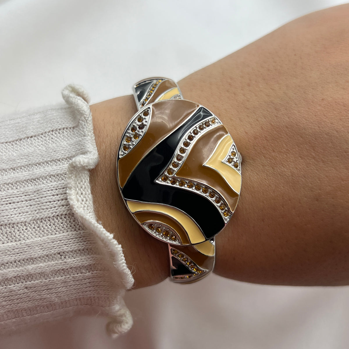 Abstract Peek-a-Boo Cuff Watch
