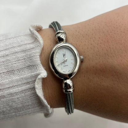 Twisted Silver-Tone Watch with Blue Gem Details