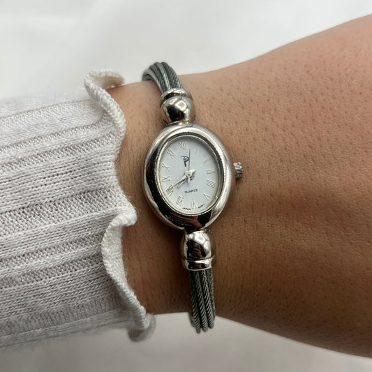Twisted Silver-Tone Watch with Blue Gem Details