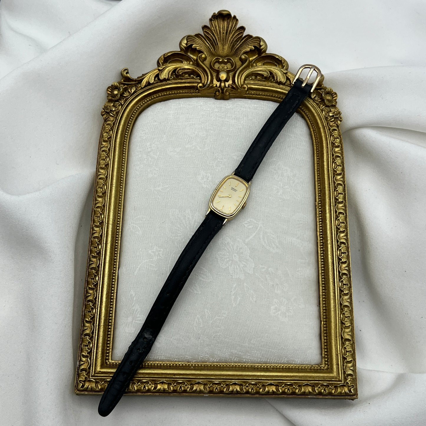Seiko Gold-Tone Oval Watch with Champagne Dial