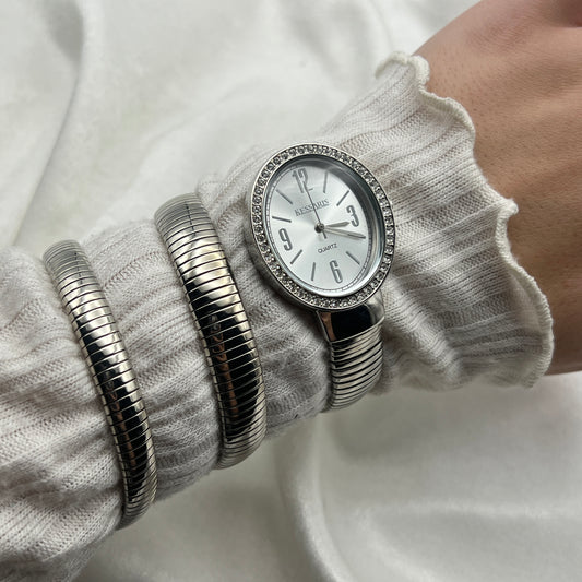 Chic Silver-Toned Wrap Watch Similar to the Bvlgari Serpenti Watch Price: ~$7,000