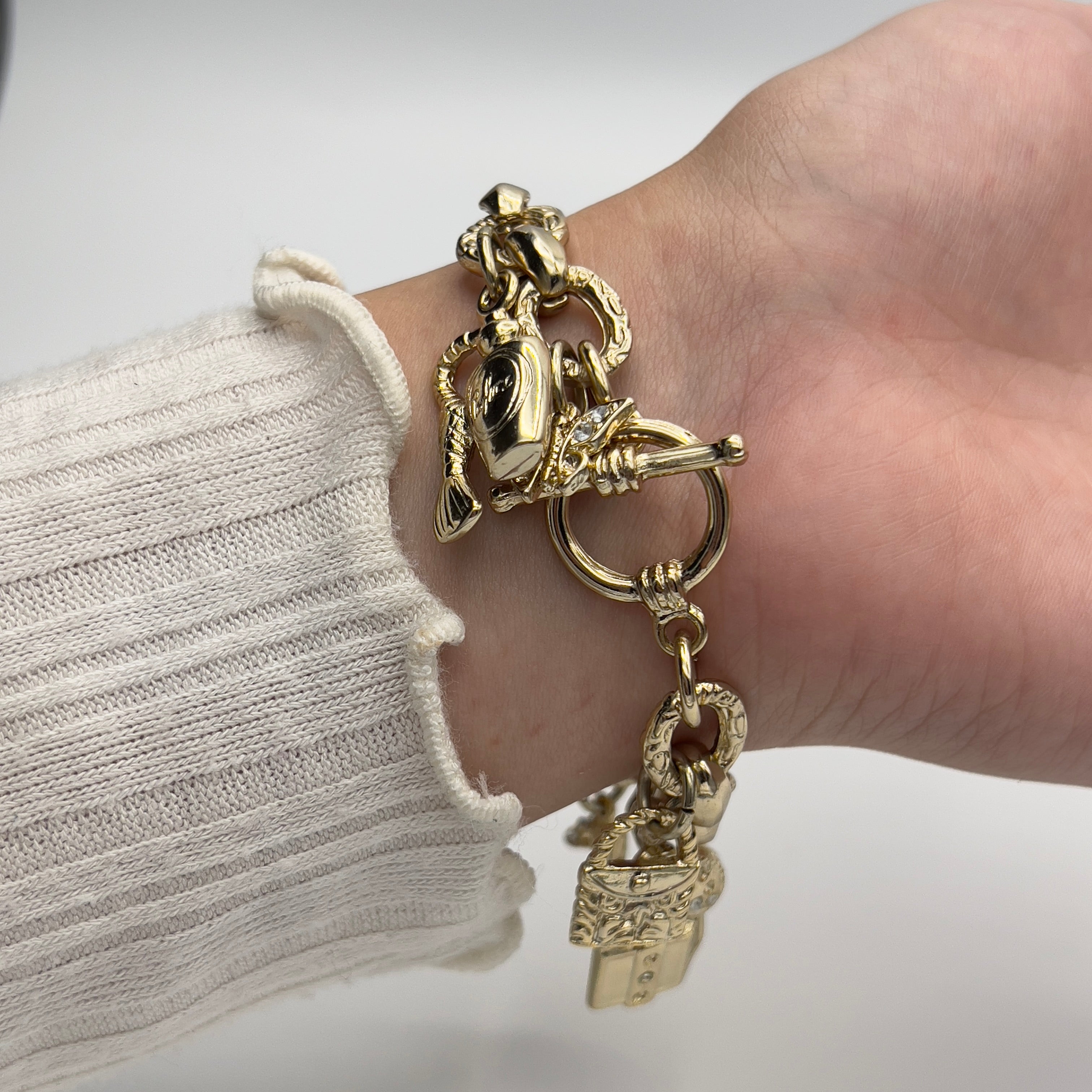 ✨Gold-Toned Charm Bracelet Watch