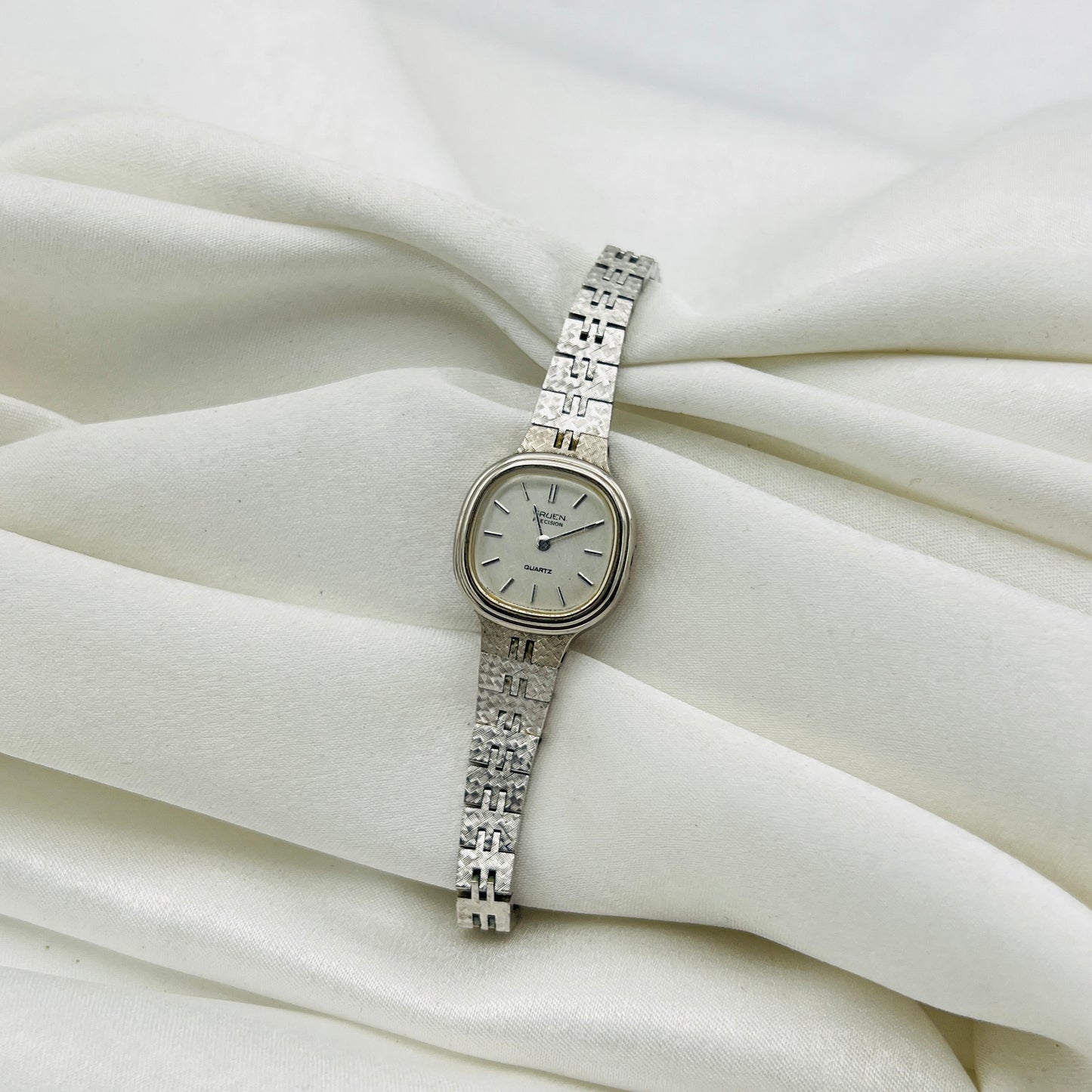 Classy Gruen Silver Tone Watch with Textured Strap