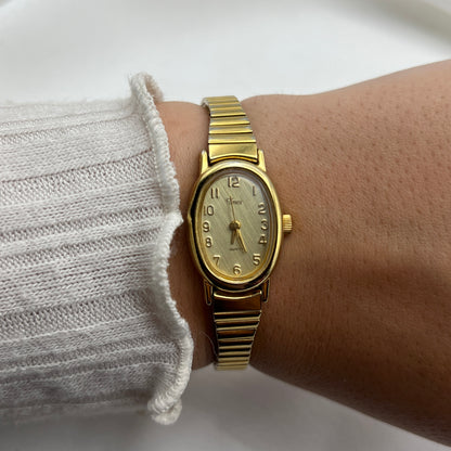 Chic Timex Gold-Tone Watch with Oval Dial