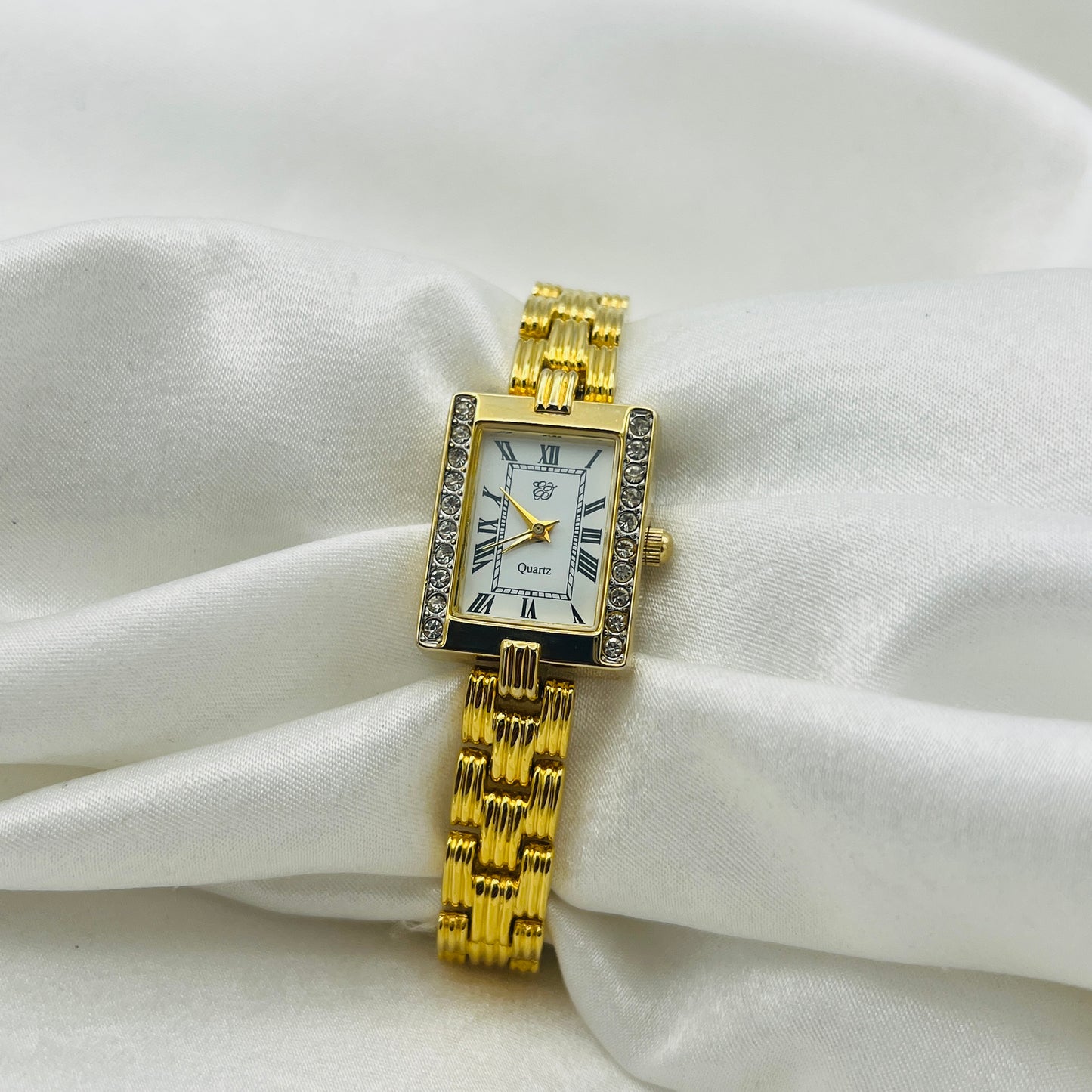 Elizabeth Taylor Gold-Toned Watch Similar to the Cartier Tank American. Price: ~$13,000