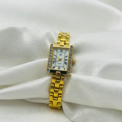 Elizabeth Taylor Gold-Toned Watch Similar to the Cartier Tank American. Price: ~$13,000