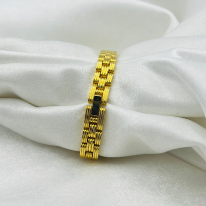 Elizabeth Taylor Gold-Toned Watch Similar to the Cartier Tank American. Price: ~$13,000