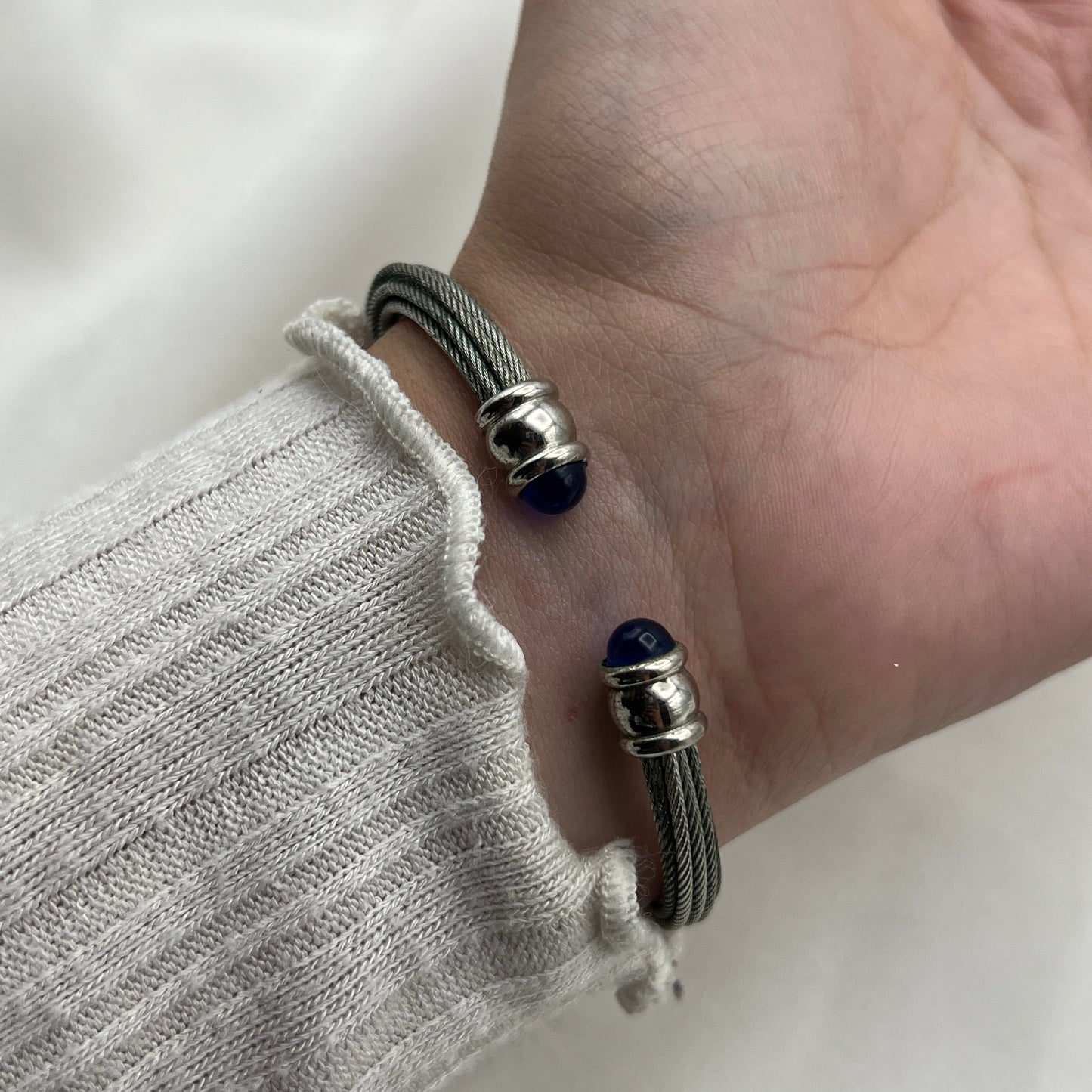 Twisted Silver-Tone Watch with Blue Gem Details