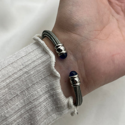 Twisted Silver-Tone Watch with Blue Gem Details