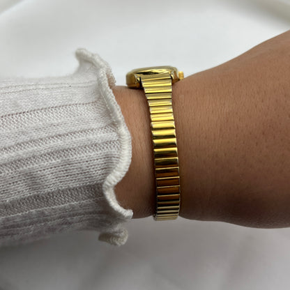 Chic Timex Gold-Tone Watch with Oval Dial