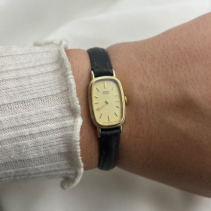 Seiko Gold-Tone Oval Watch with Champagne Dial