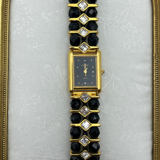 Gold-Toned Watch with Black Crystals