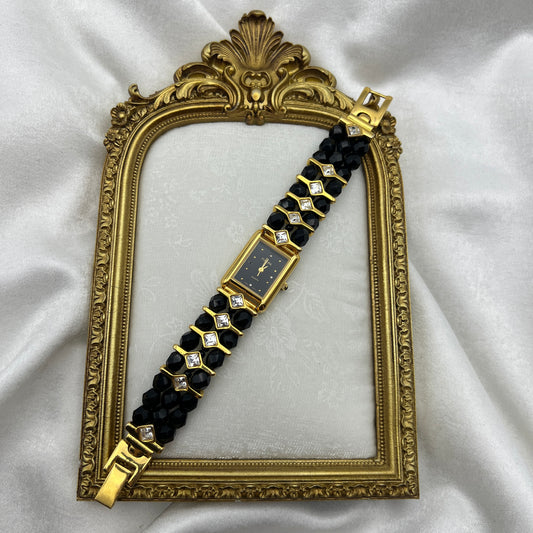 Gold-Toned Watch with Black Crystals
