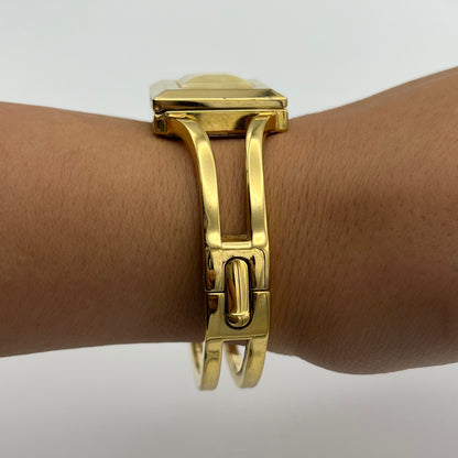Gold-Toned Peek-a-boo Watch with White Stone