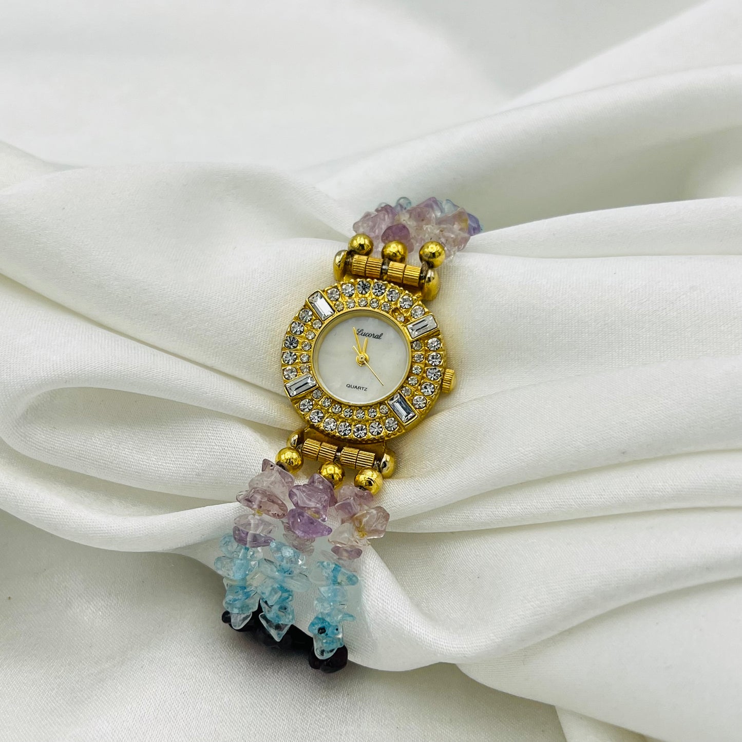 Gold-Toned Lucoral Watch with Multi-Colored Crystal Strap
