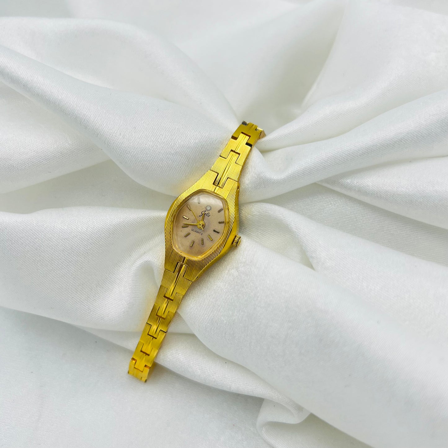 Gold-Toned Watch with Pink Dial