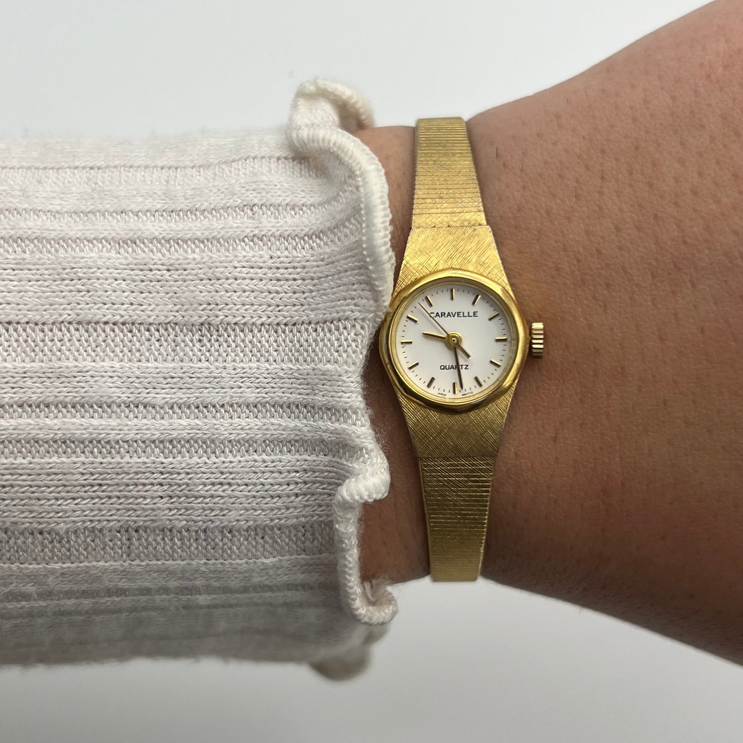 Dainty Gold-Toned Caravelle by Bulova Watch