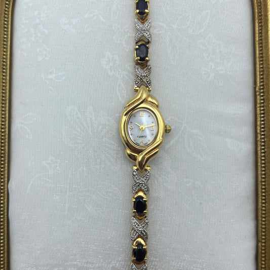 Deep Ruby-Tone Tennis Bracelet Watch with Mother of Pearl Dial