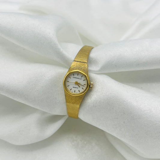 Dainty Gold-Toned Caravelle by Bulova Watch